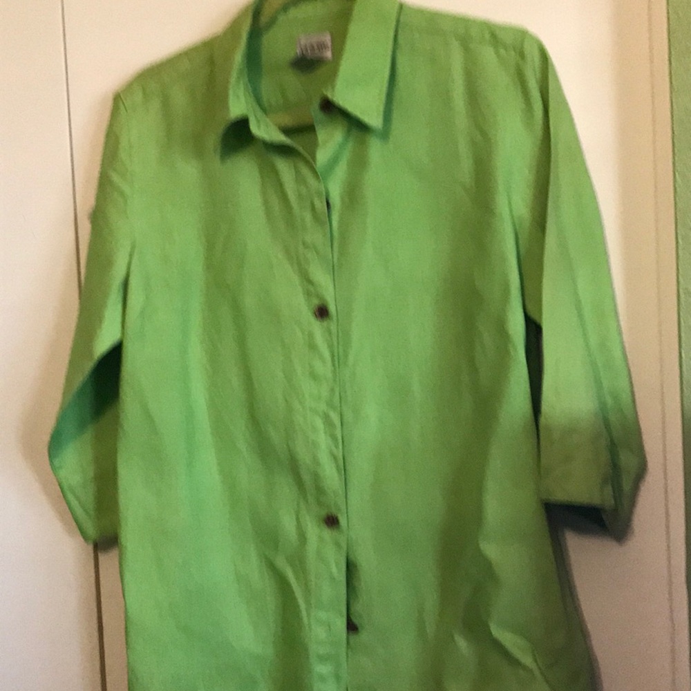 Mint Green. 3/4 length sleeves and front buttons